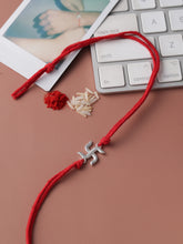 Load image into Gallery viewer, Adorn By Nikita Sterling Silver Swastik Rakhi With Roli Chawal
